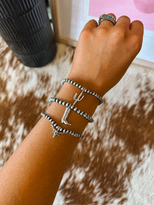 The Navajo Pearl Charm Bracelets