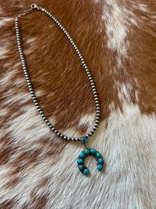 The Mini Turquoise Naja Pendant