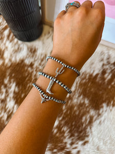 The Navajo Pearl Charm Bracelets