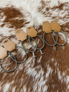 The Navajo Pearl Charm Bracelets